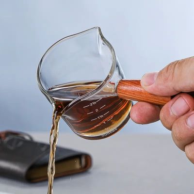 100 ml Διαφανές ποτήρι μέτρησης γυαλιού βοροσιλικίου με καπάκι με μινιμαλιστικό στυλ σχεδιασμού