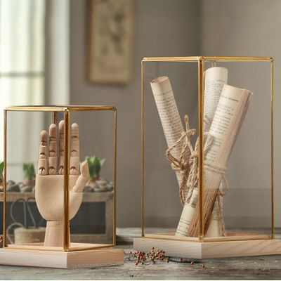 Ελαφρύ οικιακό διακόσμηση σκανδιναβικό σχεδιασμό γυάλινο κουτί οθόνης με χάλκινη επιφάνεια και ξύλινη βάση