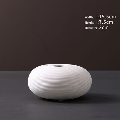 Σύγχρονο χειροποίητο στεγνό αγγείο για την διακόσμηση σε λευκή κεραμική